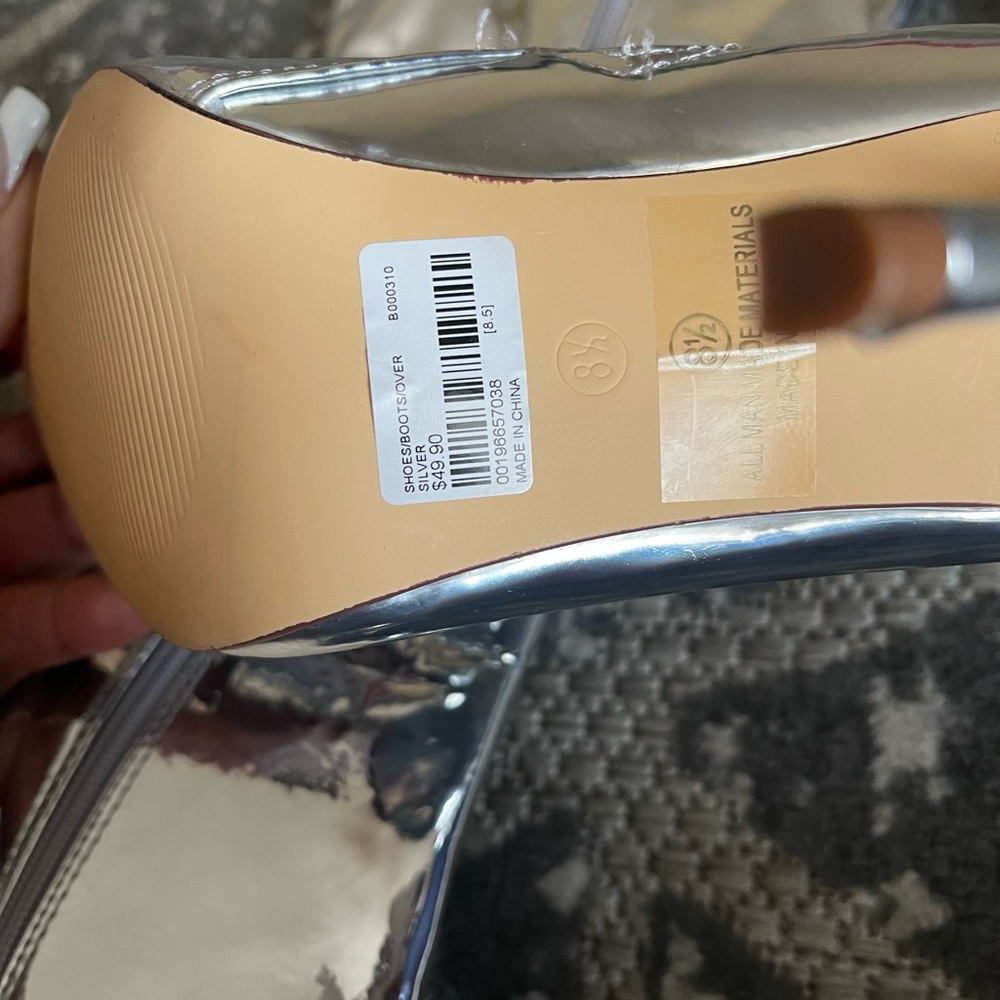 Silver high heel boots